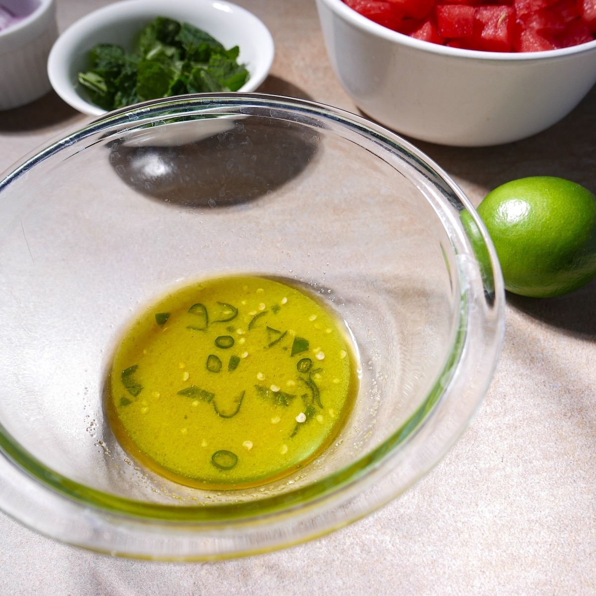 chile-lime-dressing.jpg Chile-lime dressing whisked together in a bowl.