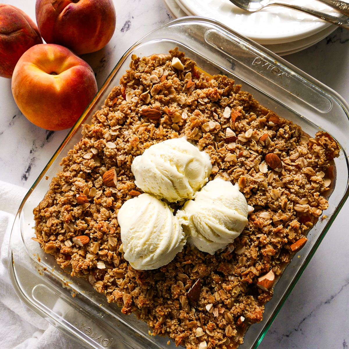 gluten-free-peach-crisp.jpg Gluten free peach crisp in a baking dish.