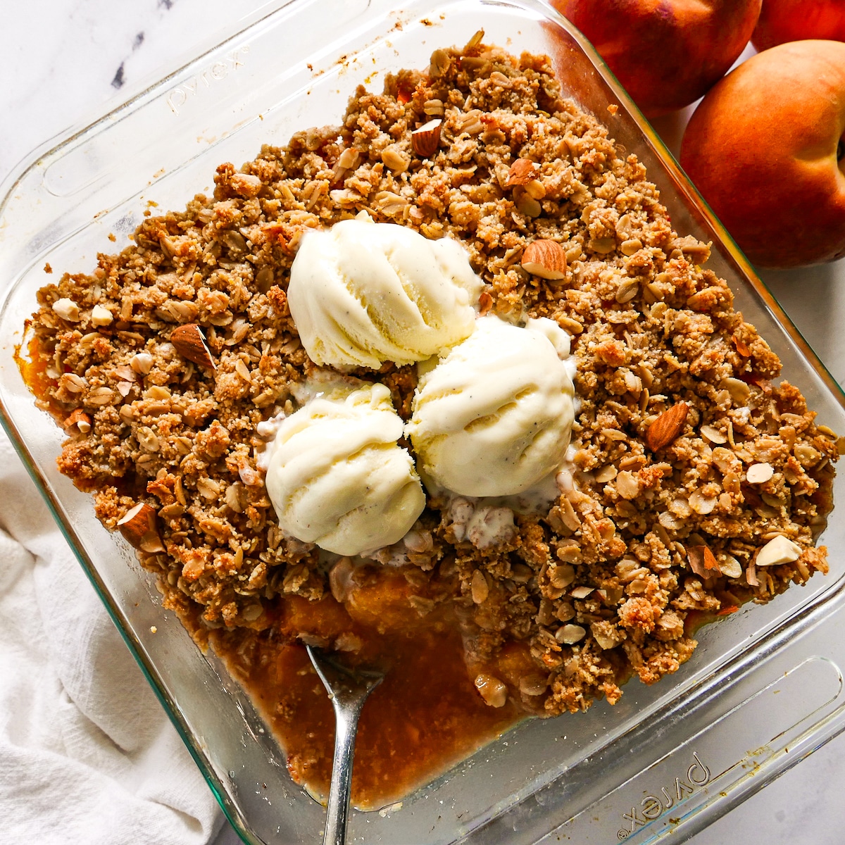 almond-flour-peach-crisp.jpg Almond flour peach crisp with oats in a baking dish.