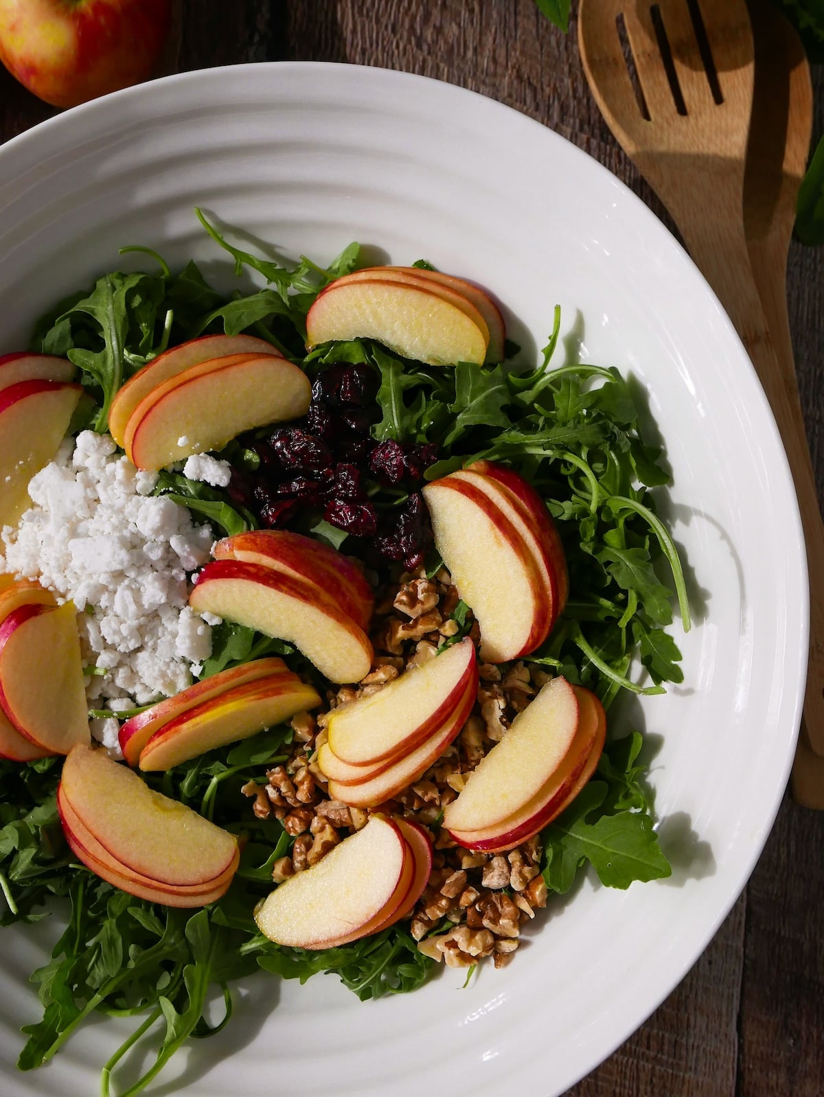 assembled-autumn-salad.jpg Assembled autumn salad with apples in a bowl.