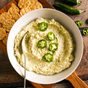 Creamy jalapeno artichoke dip in a bowl.