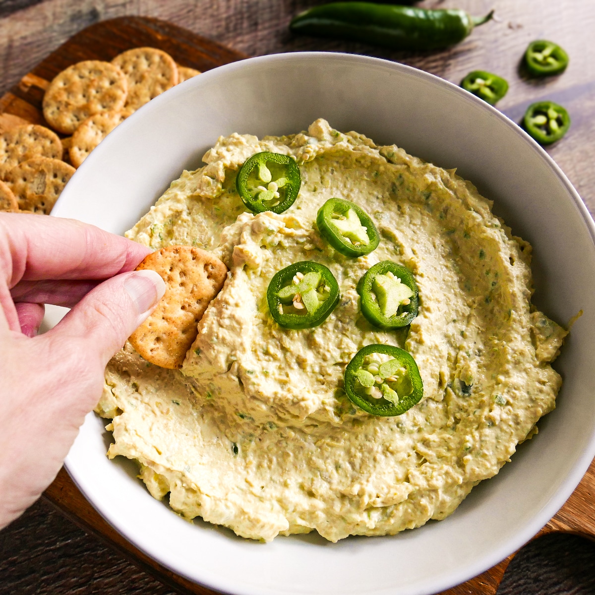 artichoke-jalapeno-dip.jpg 10-minute artichoke jalapeno dip served with crackers.
