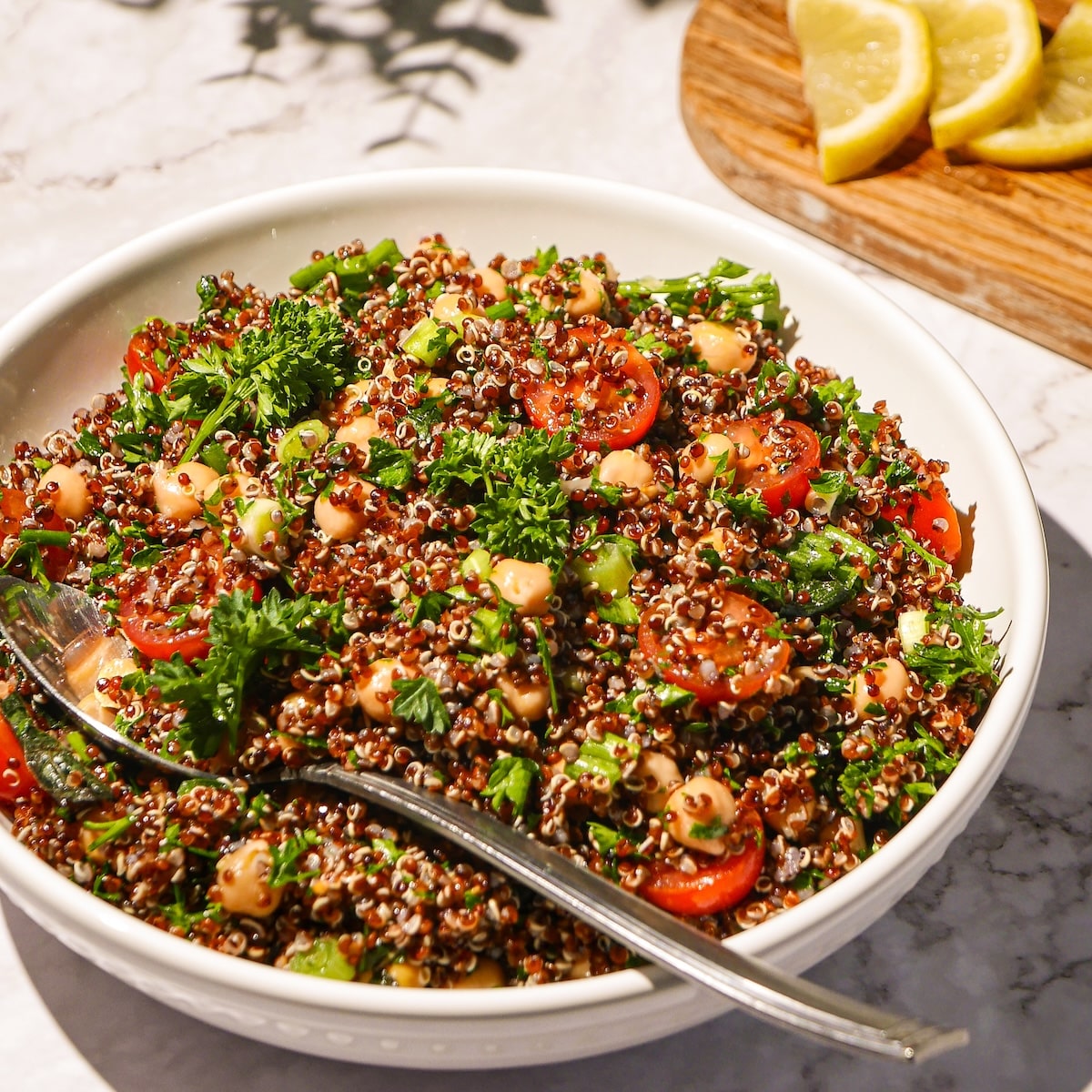 gluten-free-tabbouleh.jpg Quinoa tabbouleh with chickpeas in a bowl.