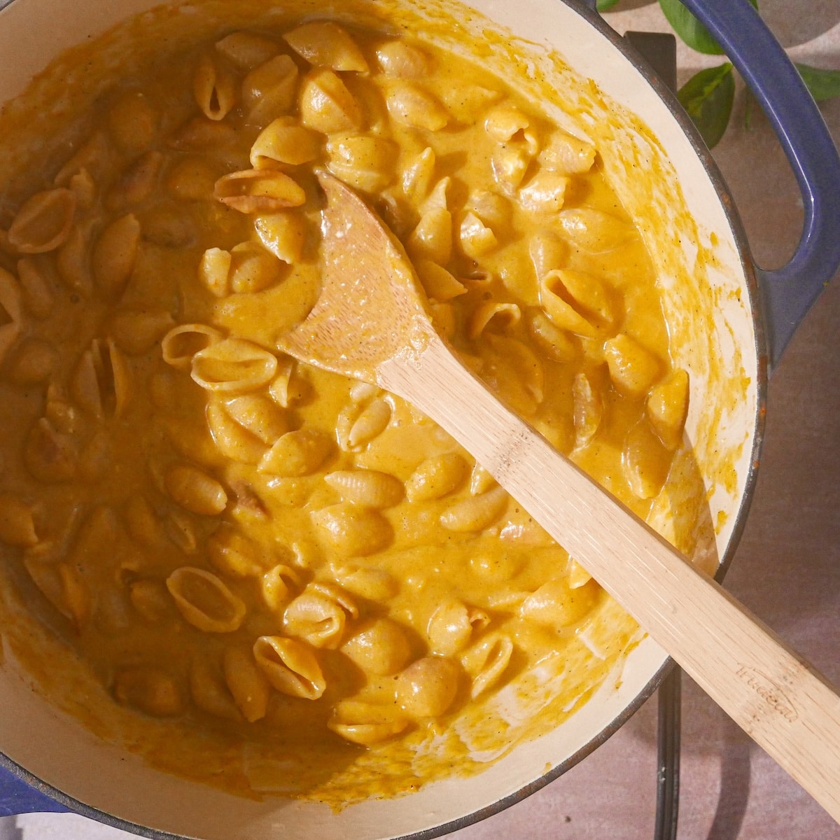 cheese-in-pasta.jpg Cheeses added to pasta in large pot.