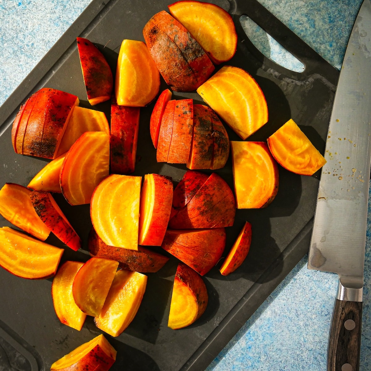 beet-wedges.jpg Scrubbed and trimmed beets cut into wedges.