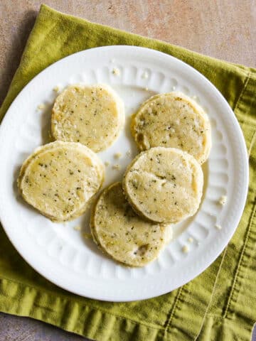 Rosemary shortbread cookies on a plate.